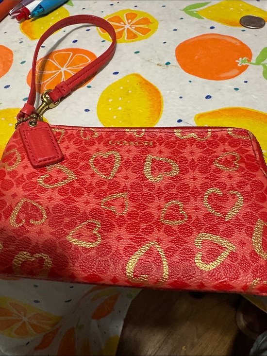 Coach Handbags - Coach Red Wristlet with Gold Heart Print